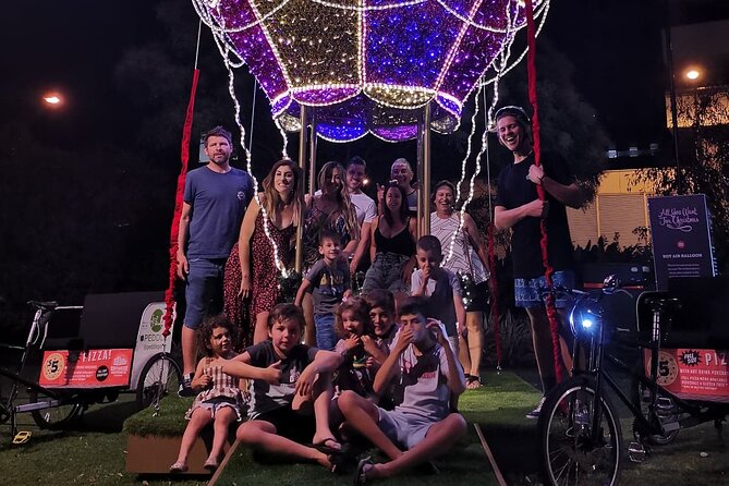 Christmas Lights Rickshaw Tour in Perth - St George’s Cathedral under Christmas projections