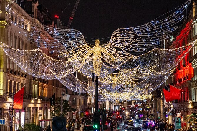 Christmas Lights Tour by Vintage Bus in London - Piccadilly Circus under giant digital screens