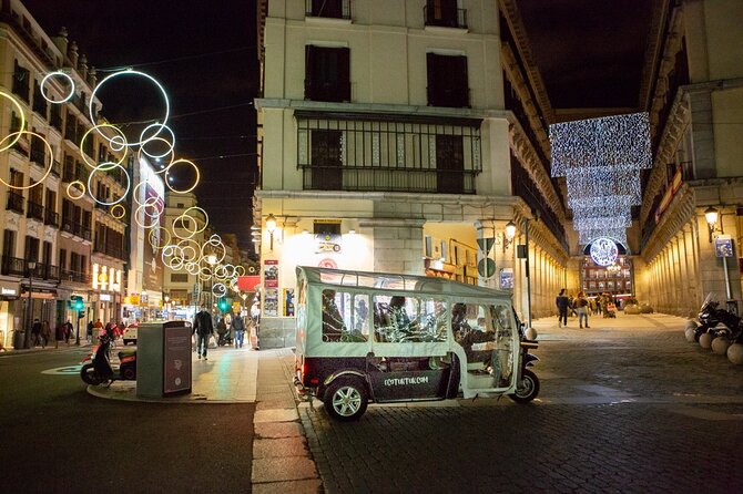Christmas Lights Tour of Madrid in Eco Tuk Tuk Private - Cibeles, the City Hall, and football tradition