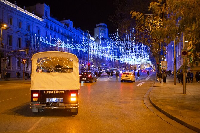 Christmas Lights Tour of Madrid in Eco Tuk Tuk Private - The Bank of Spain and Canalejas Square