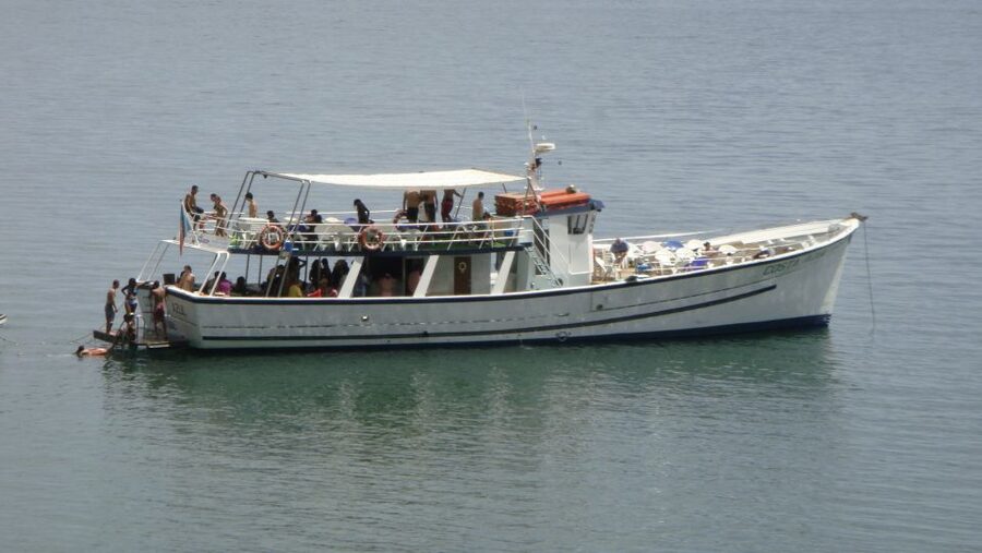 Lisbon: New Year's Eve Tagus River Cruise with Open Bar - Lisbon’s waterfront after dark