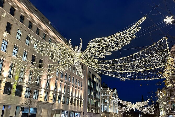 London Christmas Lights Guided Tour With Christmas Music - Seven Dials beneath a canopy of lights