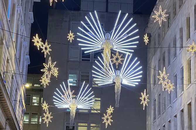 London Christmas Lights Guided Tour With Christmas Music - Leicester Square’s German Christmas market
