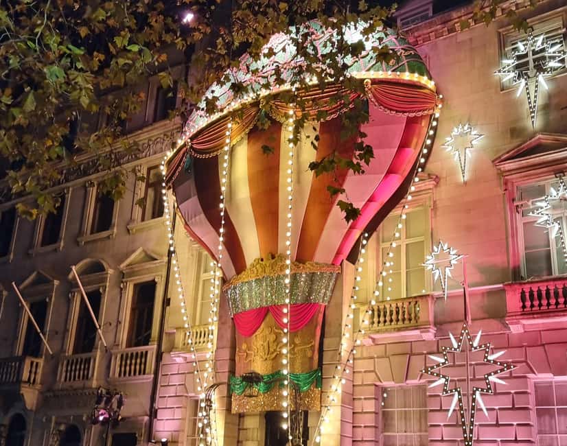 London: Christmas Lights Guided Walking Tour Small Group - Piccadilly Circus and the move toward Regent Street
