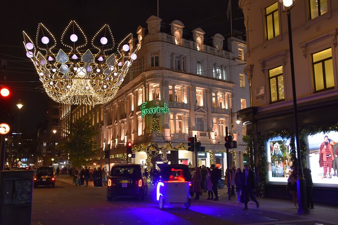 London Christmas Lights Private Walking Tour - Regent Street, royal design, and a warm bookstore