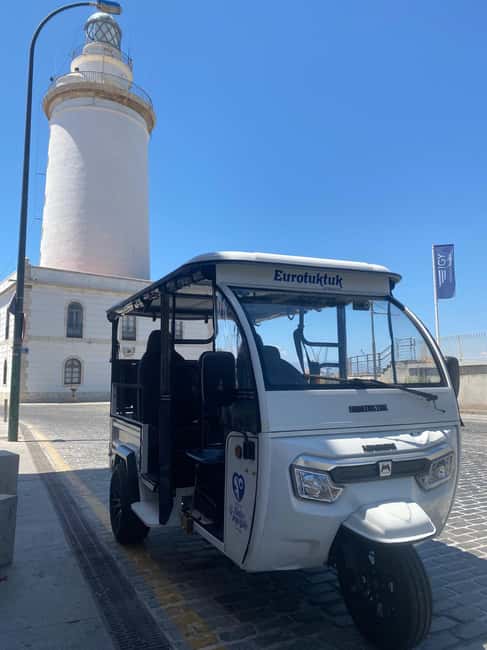 Malaga: Christmas Night Tour and Lights with Tuk Tuk - Seeing Malaga from Gibralfaro Castle