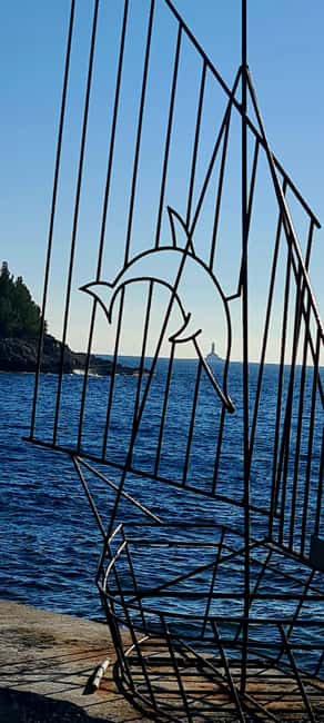 Medulin: Christmas Boat Trip with Lunch and Drinks - Porer Lighthouse photo stop