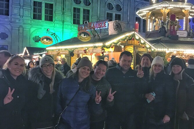 Original Munich Christmas Market Tour with Festive Wine and Food - The Residenz courtyard and a medieval-style market