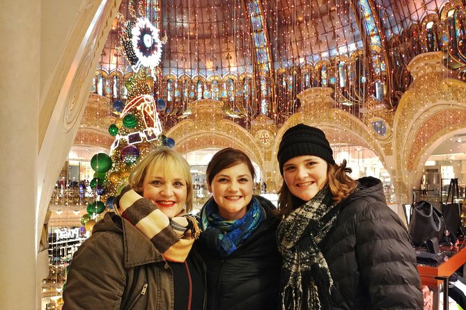 Paris Christmas Illuminations and Local Festivities Private Tour - A Ferris wheel over the Tuileries holiday market