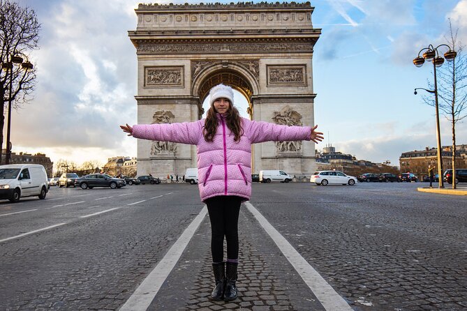 Paris Christmas Lights & Stories with Tastings on Champs-Élysées - Golden statues and the lights of Les Invalides