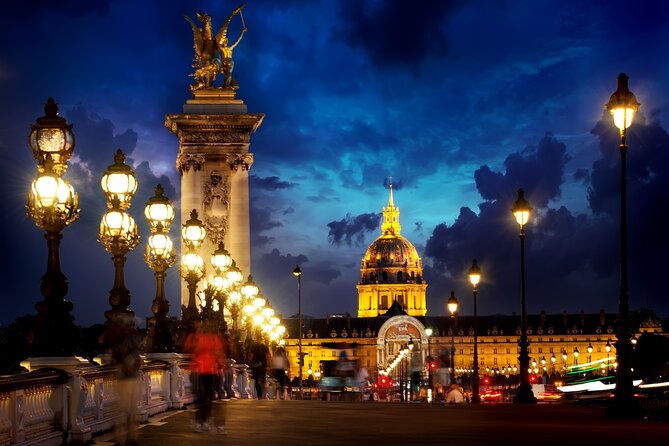 Paris Christmas Lights & Stories with Tastings on Champs-Élysées - Starting beneath the Grand Palais dome