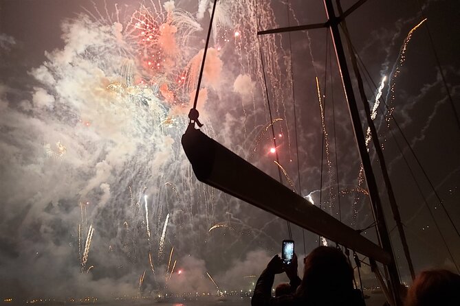 Passing the Year in a Boat with Champagne and Fireworks - Cristo Rei and the view across the river