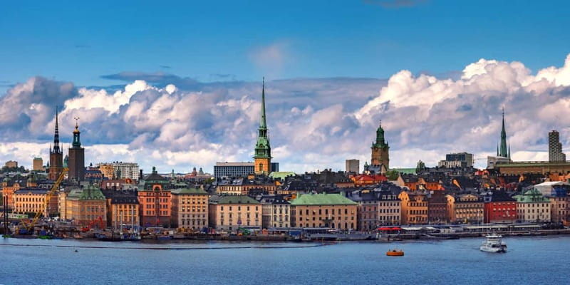 Stockholm: Christmas Market Magic Walking Tour with a Local - St George statues and stories from the square