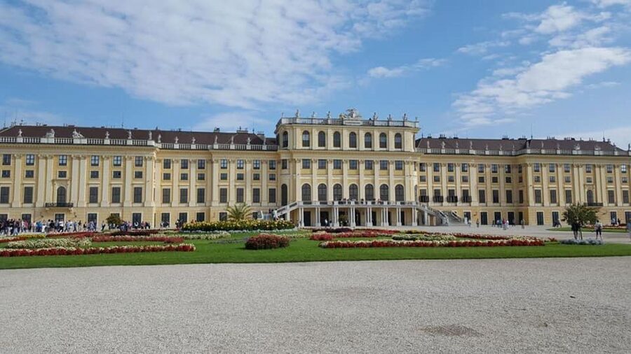 Vienna: Schönbrunn Palace & Christmas Market Walking Tour - Entering Schönbrunn Palace in a small group